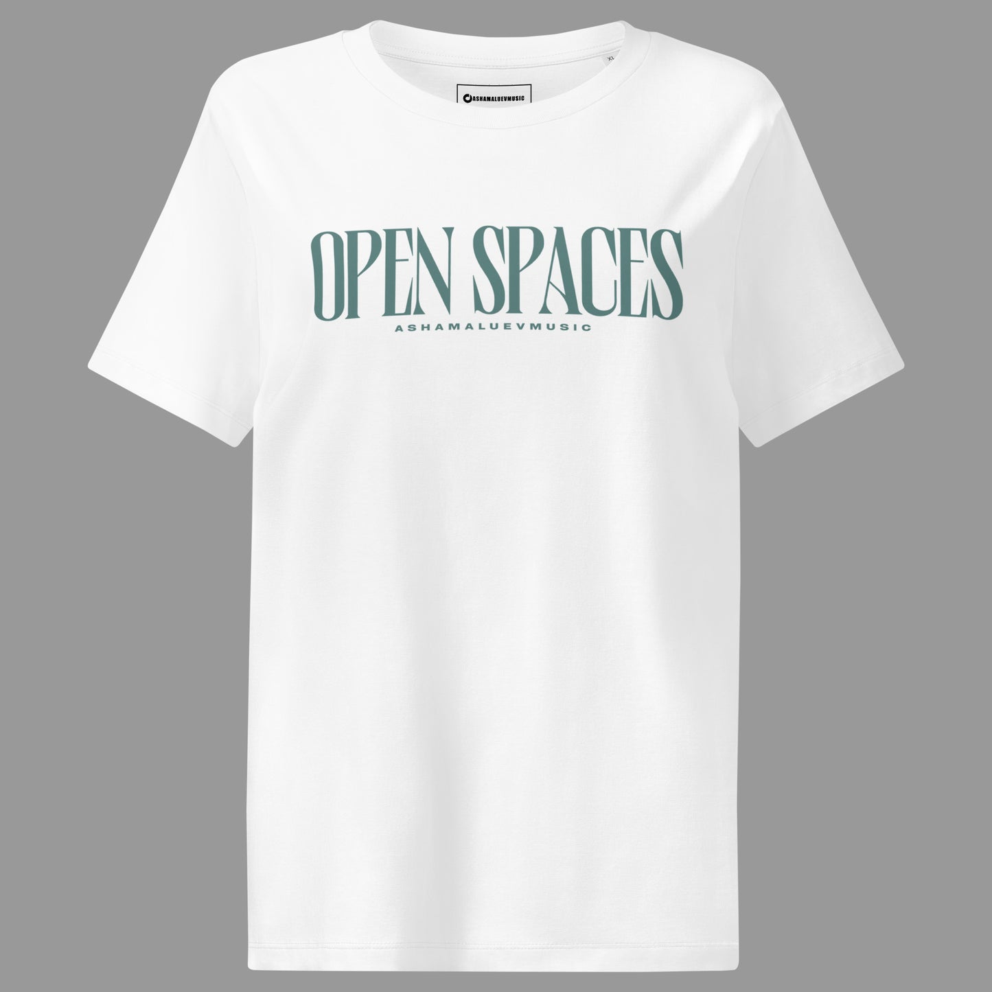 White women's t-shirt with 'Open Spaces' and 'AShamaluevMusic' text on a gray background.