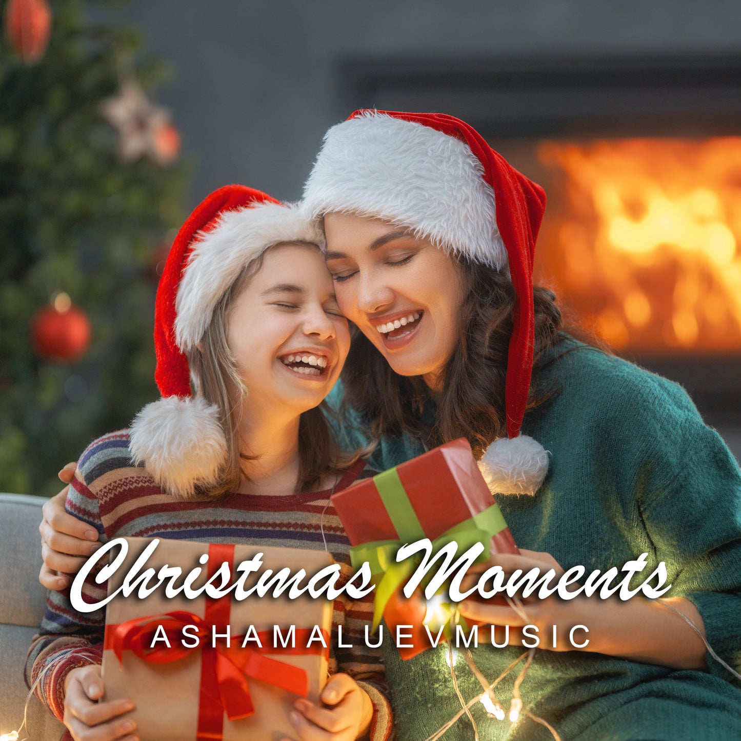 Cover art of the music track 'Christmas Moments' by AShamaluevMusic, which shows the two people wearing Santa hats with a Christmas gift in front of a fireplace.
