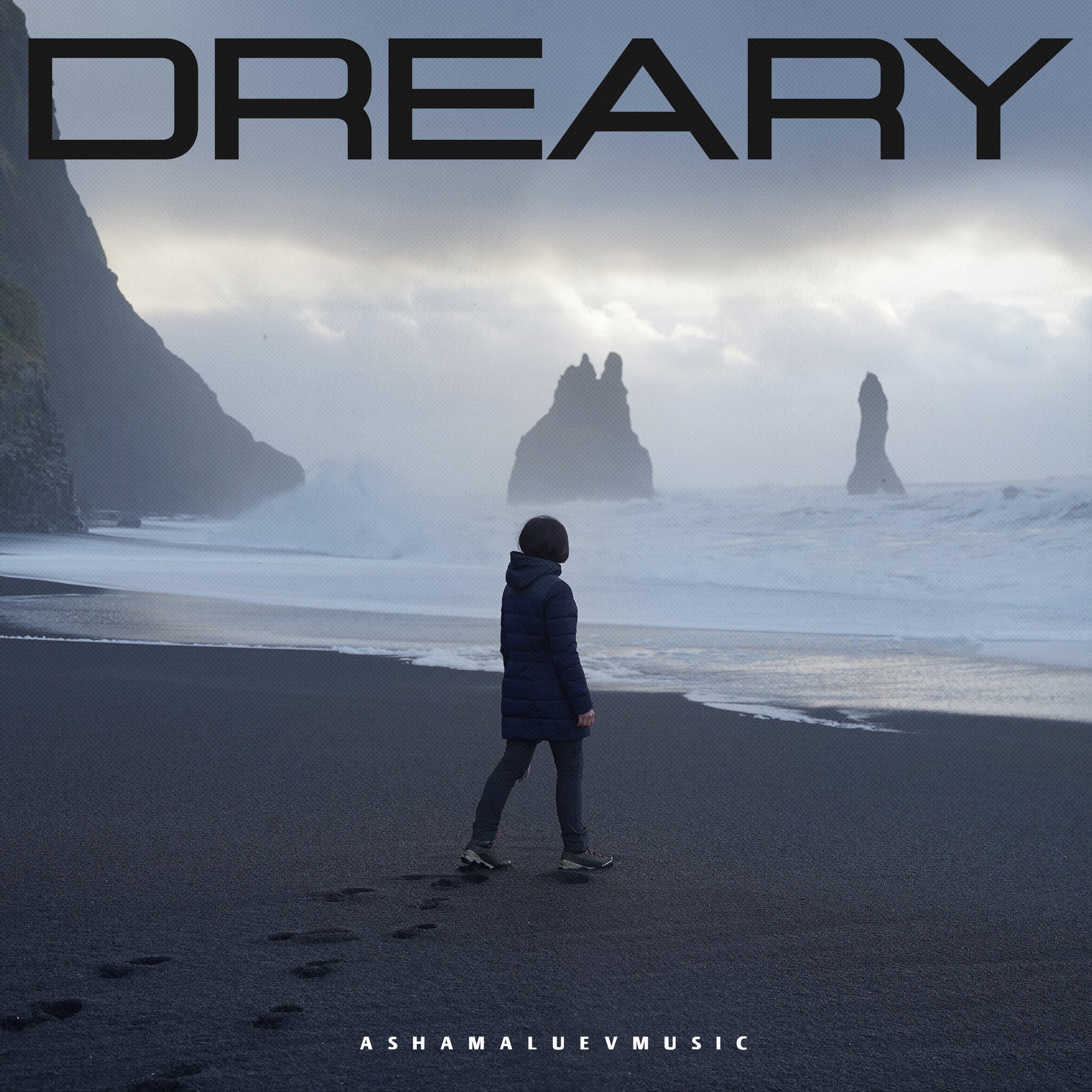 Cover art of the music track 'Dreary' by AShamaluevMusic, which shows the person standing on a misty beach.