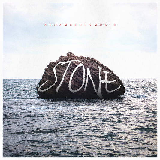 Cover art of the music track 'Stone' by AShamaluevMusic, which shows the rock in the ocean.