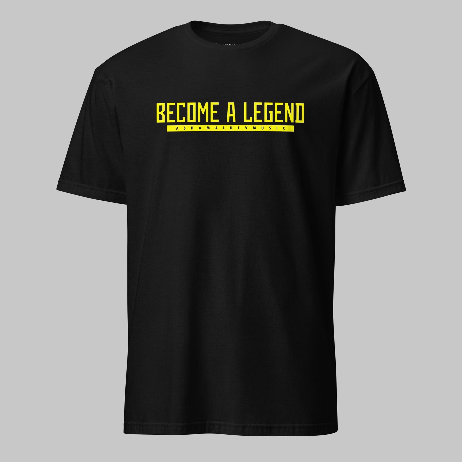 A black unisex T-shirt with the text 'BECOME A LEGEND AShamaluevMusic' printed in yellow on the front.