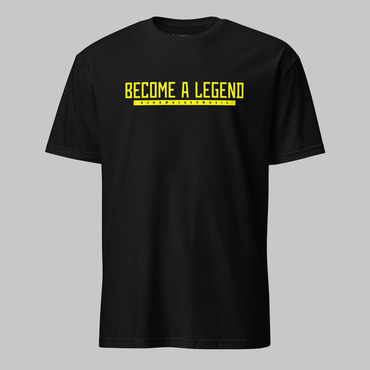 A black unisex T-shirt with the text 'BECOME A LEGEND AShamaluevMusic' printed in yellow on the front.