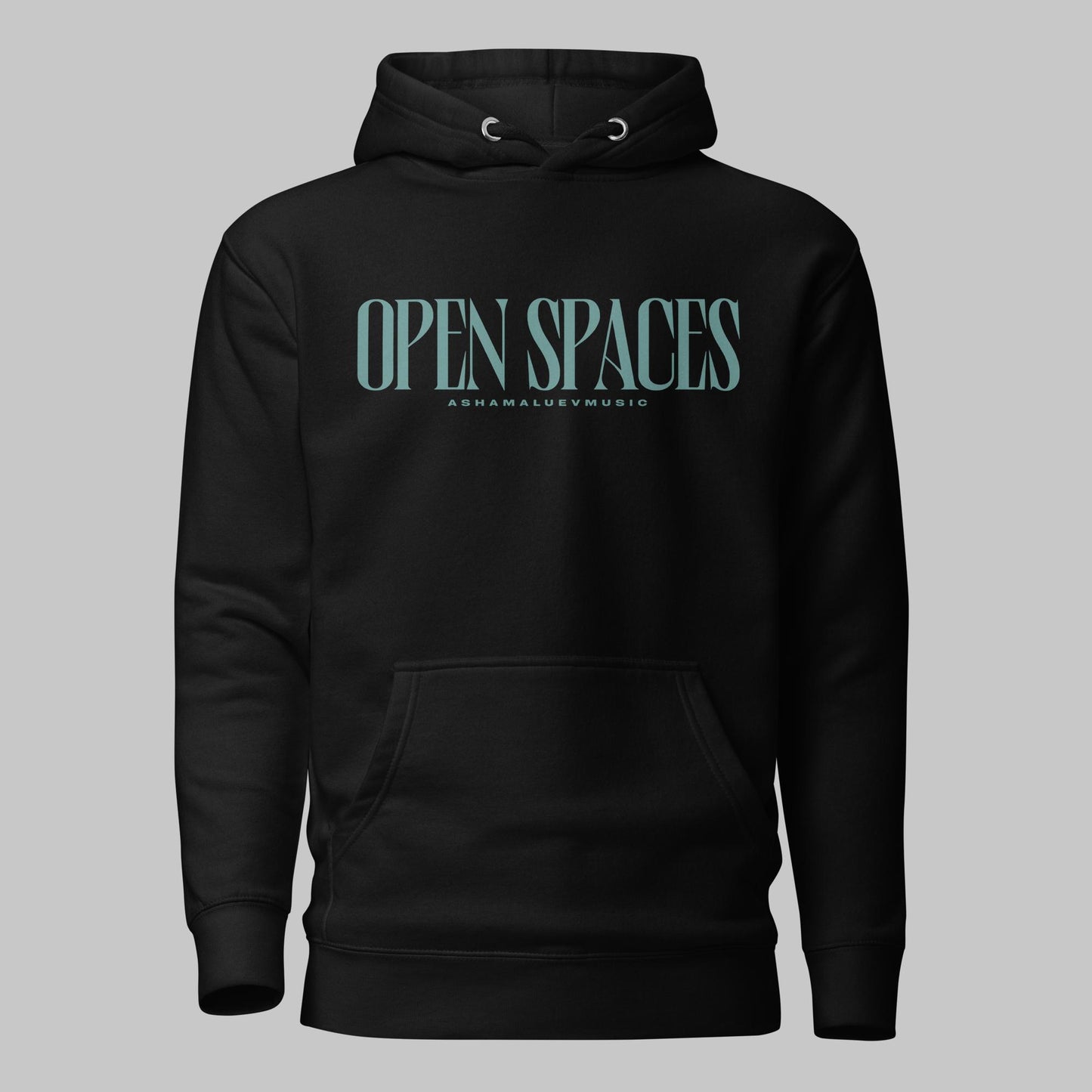 Black unisex premium hoodie with turquoise text 'Open Spaces' and 'AShamaluevMusic' on a gray background