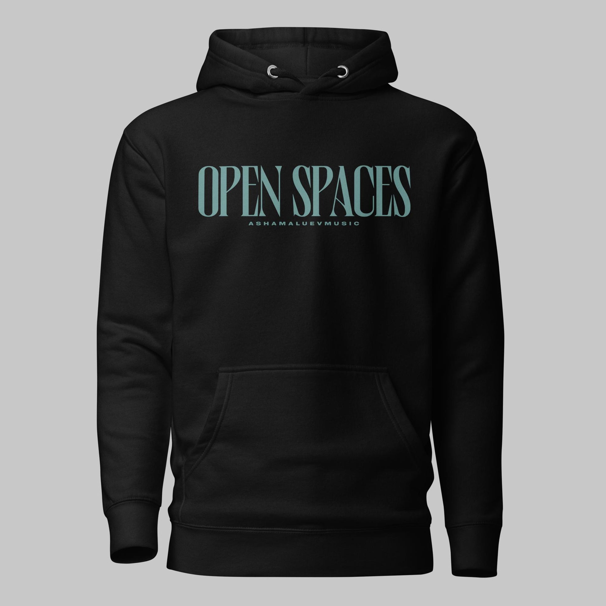 Black unisex premium hoodie with turquoise text 'Open Spaces' and 'AShamaluevMusic' on a gray background
