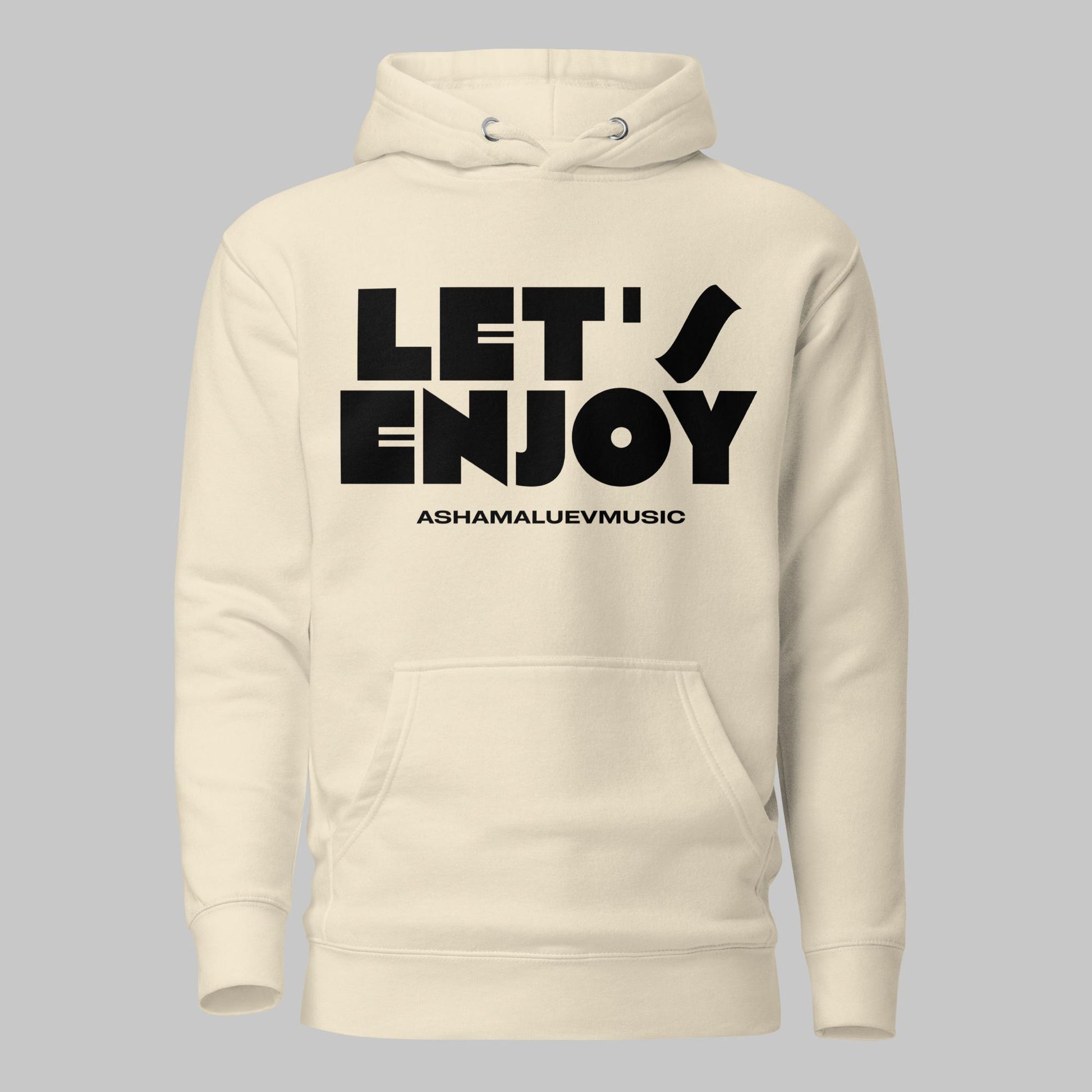 Bone unisex pullover hoodie with black text 'LET'S ENJOY' and 'ASHAMALUEVMUSIC' on a gray background.