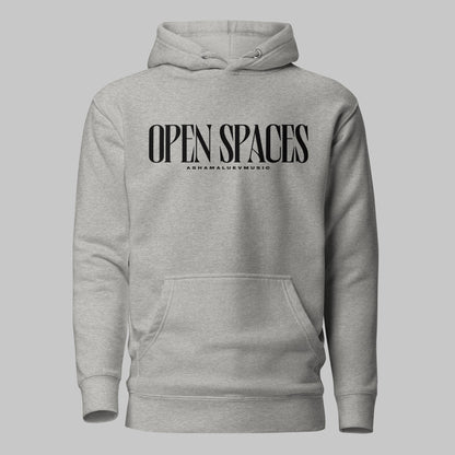 Carbon grey unisex pullover premium hoodie with black text 'OPEN SPACES' and 'AShamaluevMusic' on a gray background.