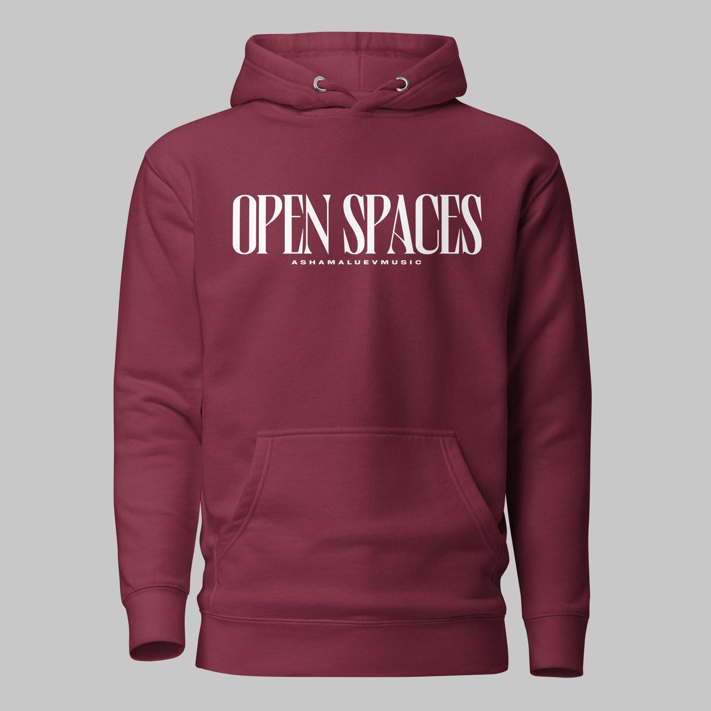 Maroon unisex pullover premium hoodie with white text 'OPEN SPACES' and 'AShamaluevMusic' on a gray background.