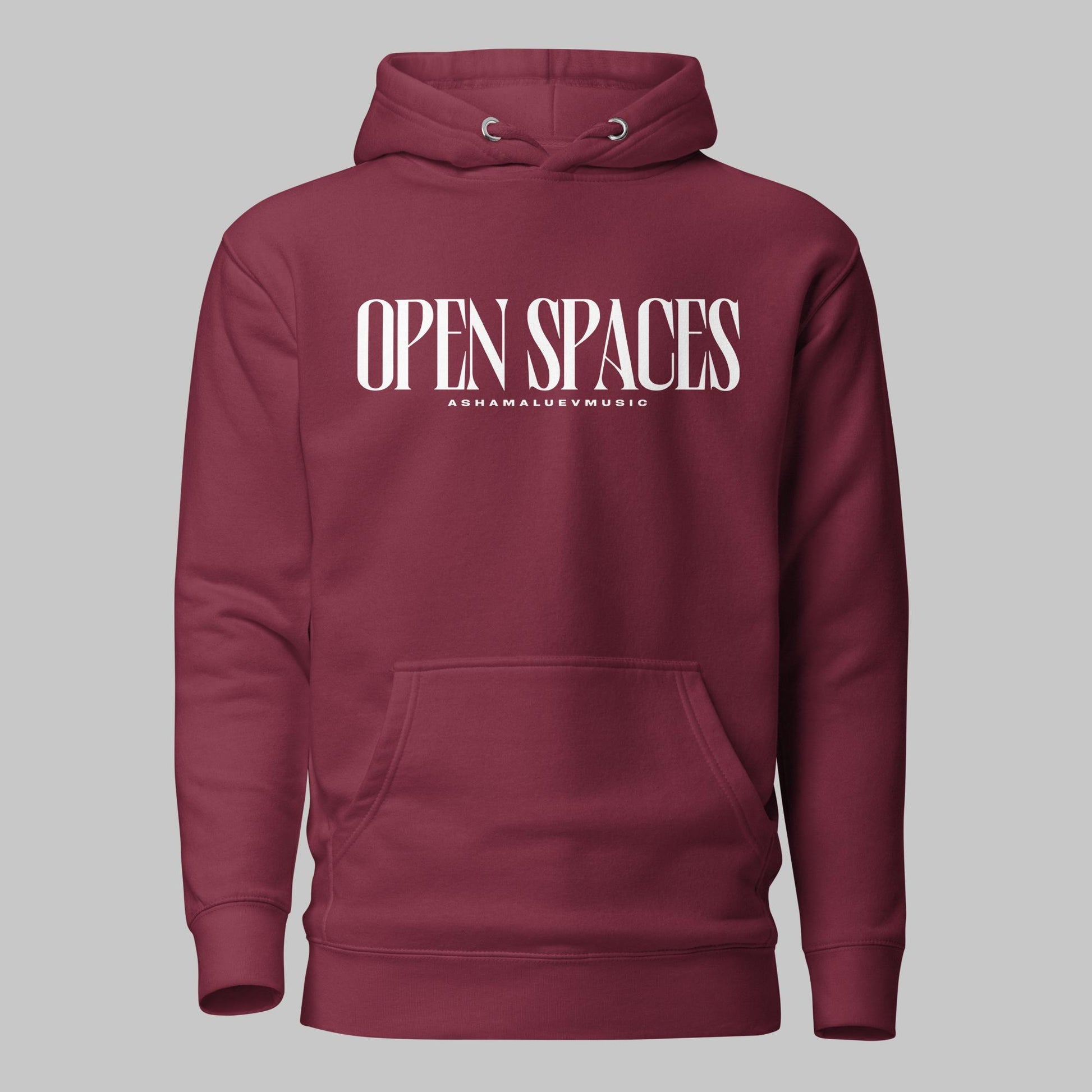 Maroon unisex pullover premium hoodie with white text 'OPEN SPACES' and 'AShamaluevMusic' on a gray background.
