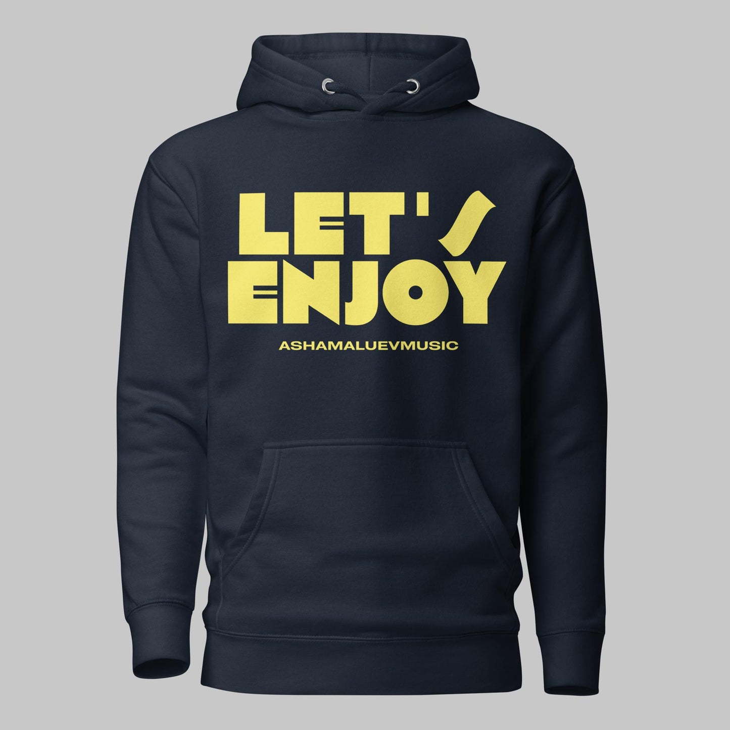 Navy blazer unisex pullover hoodie with yellow text 'LET'S ENJOY' and 'ASHAMALUEVMUSIC' on a gray background.