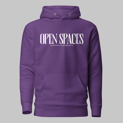 Purple unisex pullover premium hoodie with white text 'OPEN SPACES' and 'AShamaluevMusic' on a gray background.