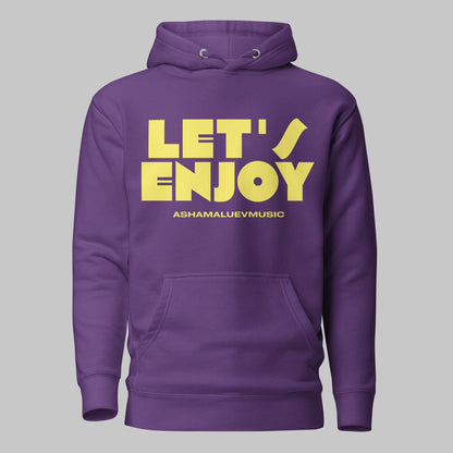 Purple unisex pullover hoodie with yellow text 'LET'S ENJOY' and 'ASHAMALUEVMUSIC' on a gray background.