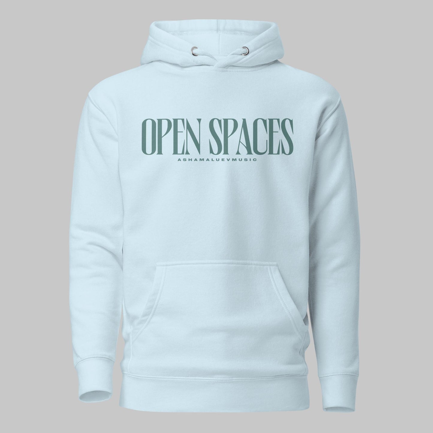 Sky blue unisex premium hoodie with turquoise text 'Open Spaces' and 'AShamaluevMusic' on a gray background