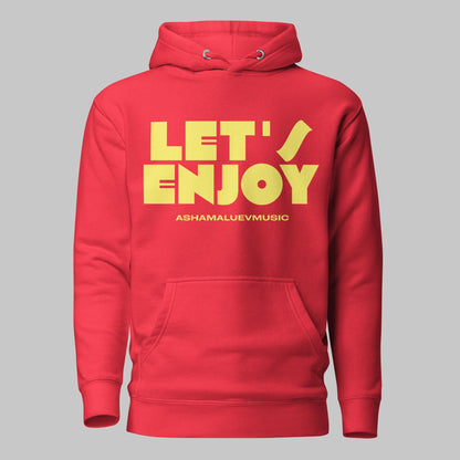 Team red unisex pullover hoodie with yellow text 'LET'S ENJOY' and 'ASHAMALUEVMUSIC' on a gray background.