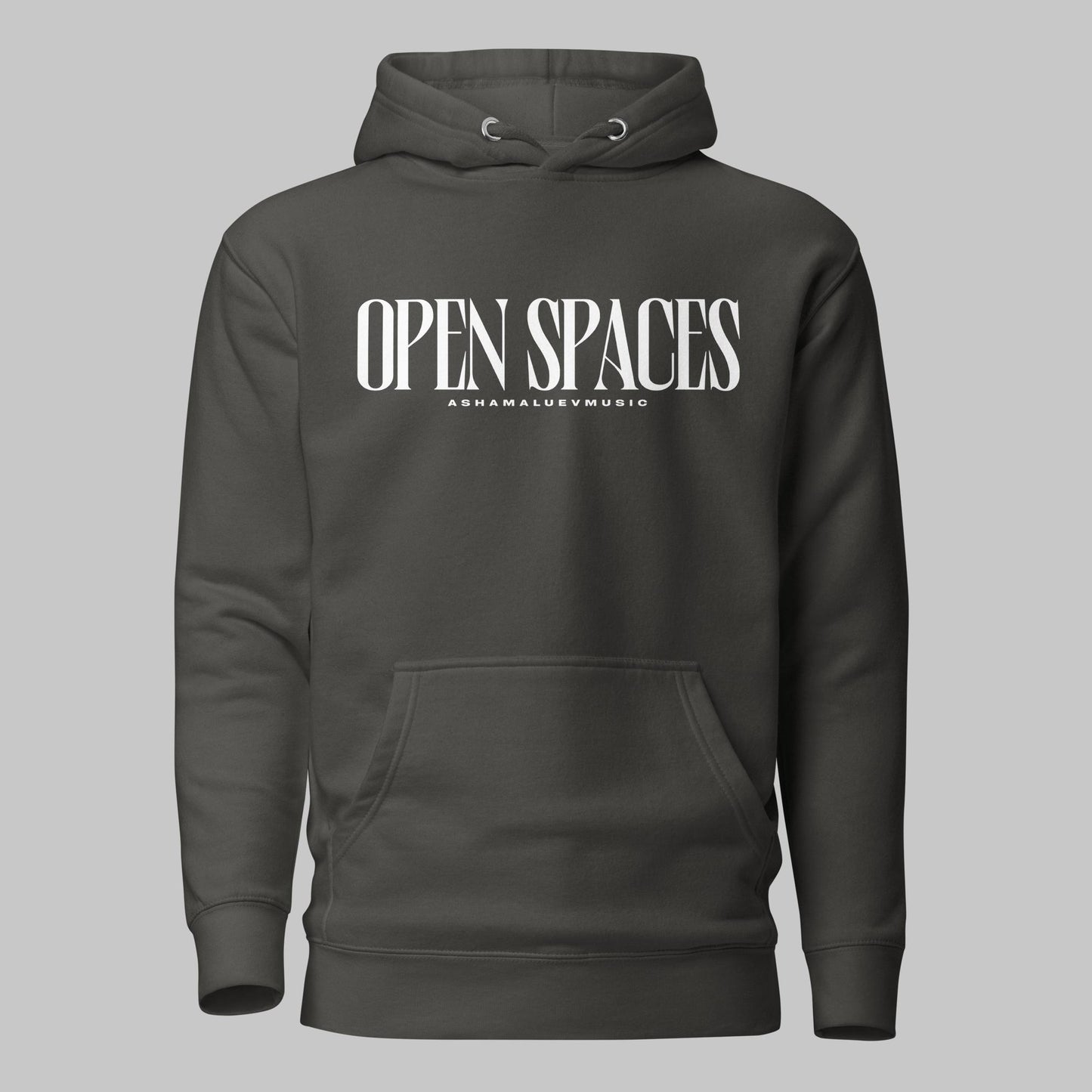 Vintage black unisex pullover premium hoodie with white text 'OPEN SPACES' and 'AShamaluevMusic' on a gray background.