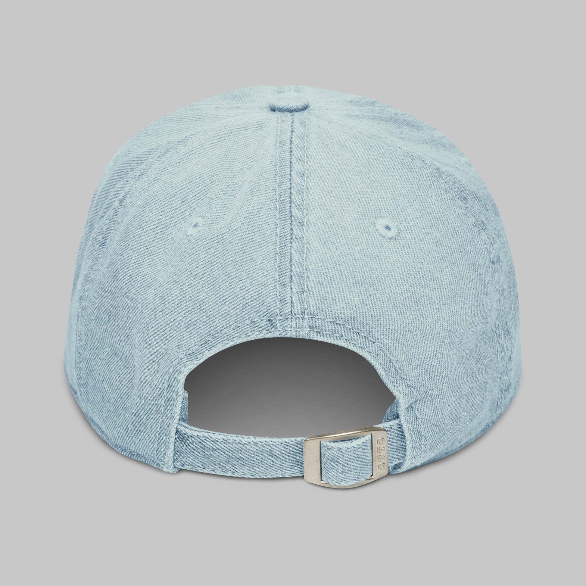 Light blue denim cap on a gray background