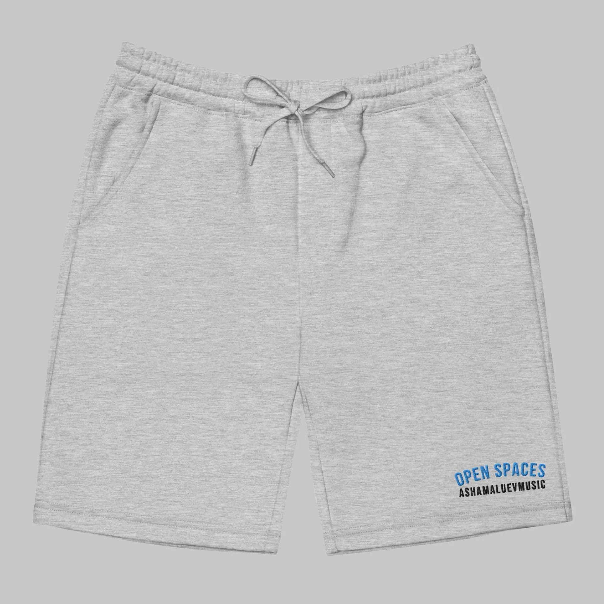 Gray men's fleece shorts with 'Open Spaces' and 'AShamaluevMusic' logo on a gray background