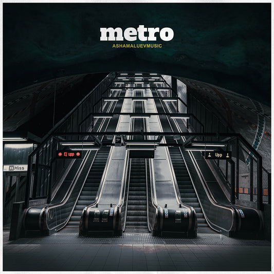 Cover art of the music track 'Metro' by AShamaluevMusic, which shows the escalators in a metro station.