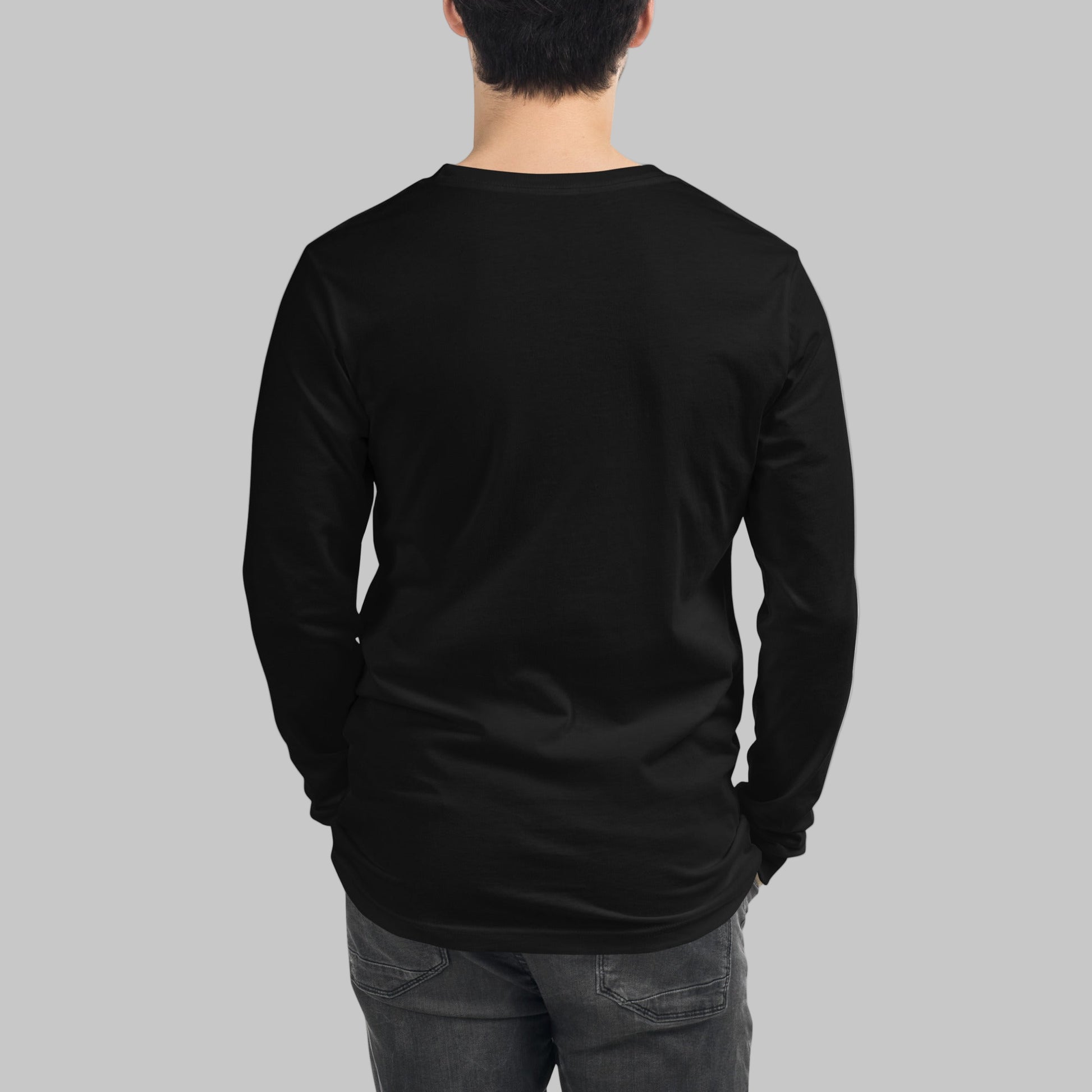 Person wearing a black long-sleeve shirt on a grey background