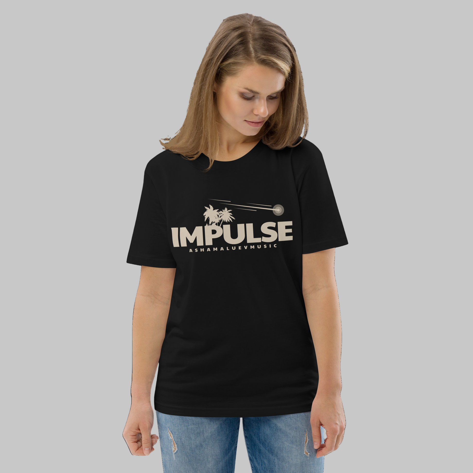 Woman wearing a black t-shirt with 'IMPULSE' logo on a grey background