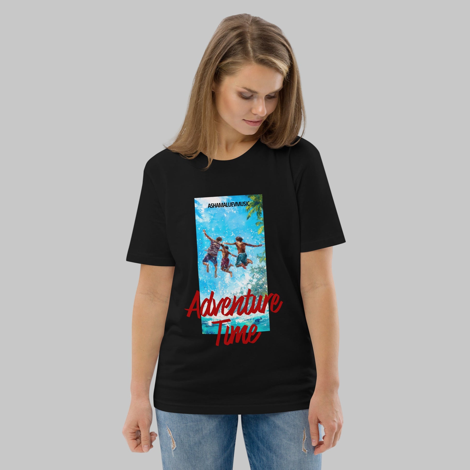 Woman wearing a black t-shirt with 'Adventure Time' graphic design and AShamaluevMusic logo on a grey background.