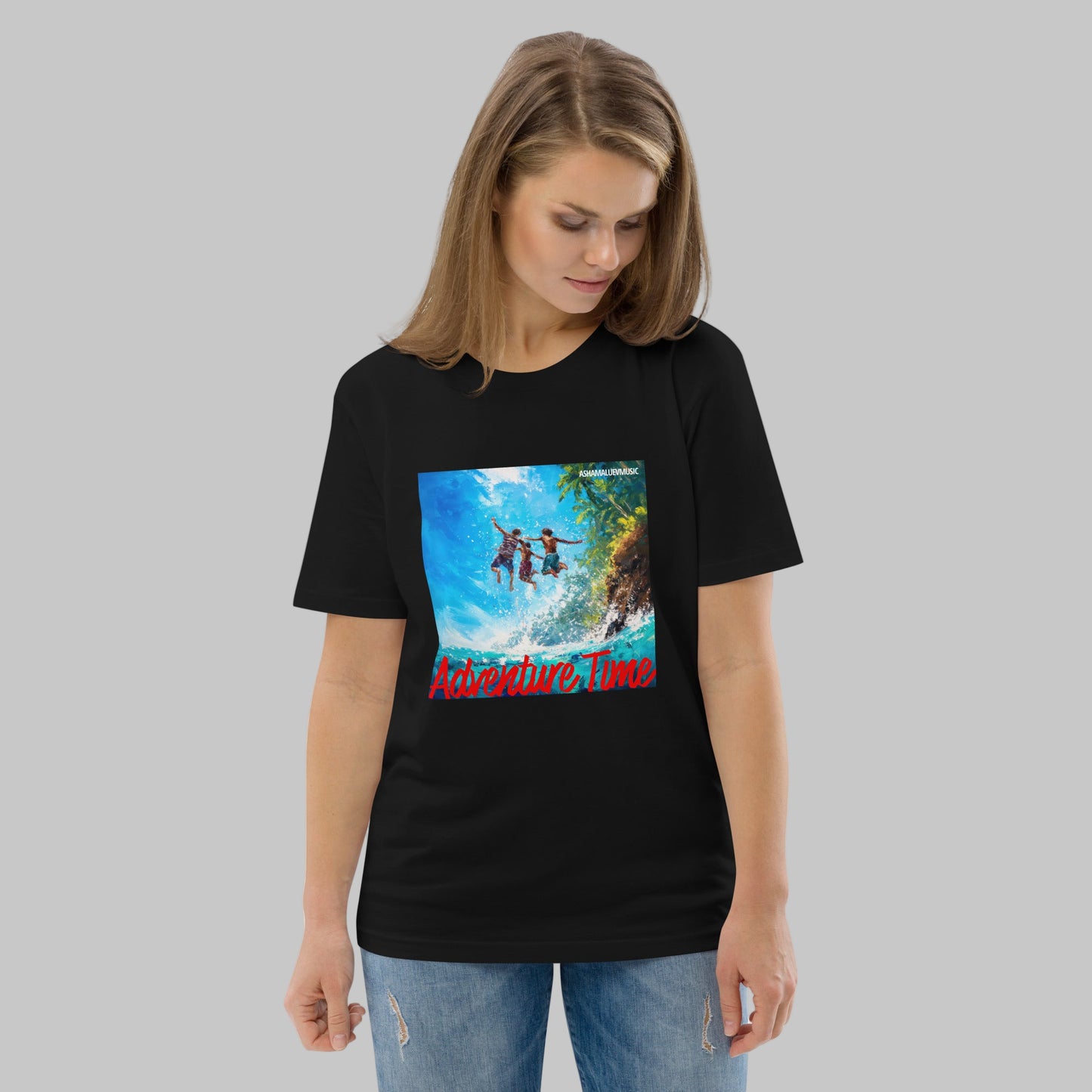 Woman wearing a black t-shirt with a 'Adventure Time' graphic design and AShamaluevMusic logo on a grey background.