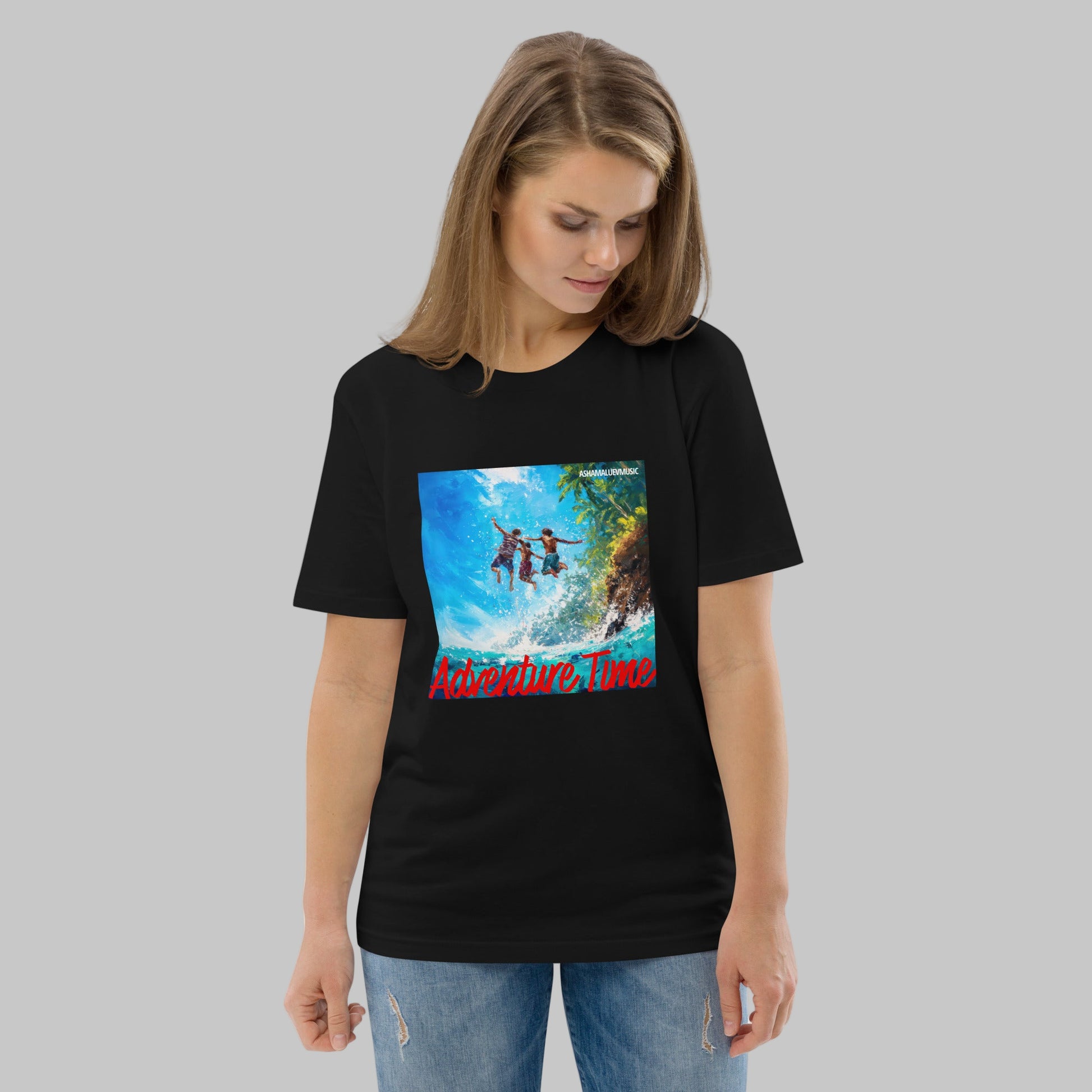 Woman wearing a black t-shirt with a 'Adventure Time' graphic design and AShamaluevMusic logo on a grey background.