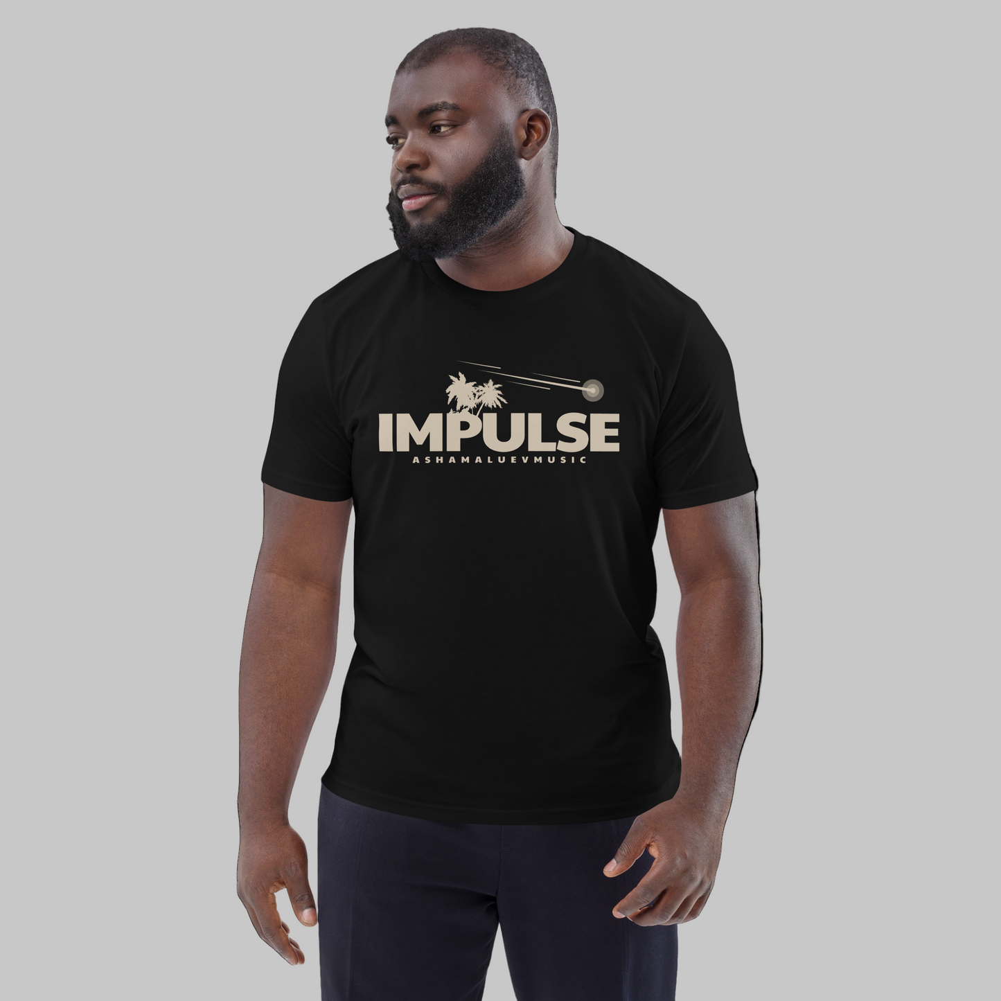 Man wearing a black t-shirt with text 'IMPULSE' and AShamaluevMusic logo on a grey background