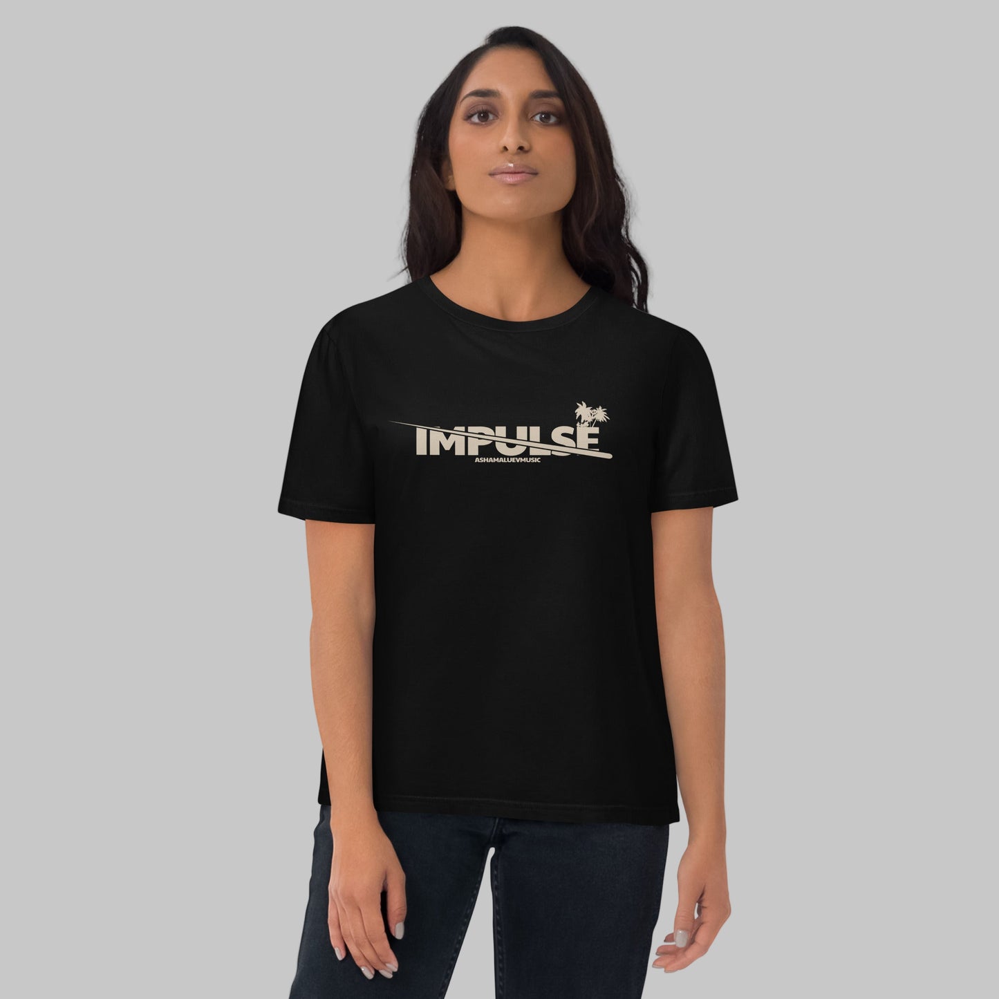 Woman wearing a black t-shirt with text 'IMPULSE' and AShamaluevMusic logo on a grey background