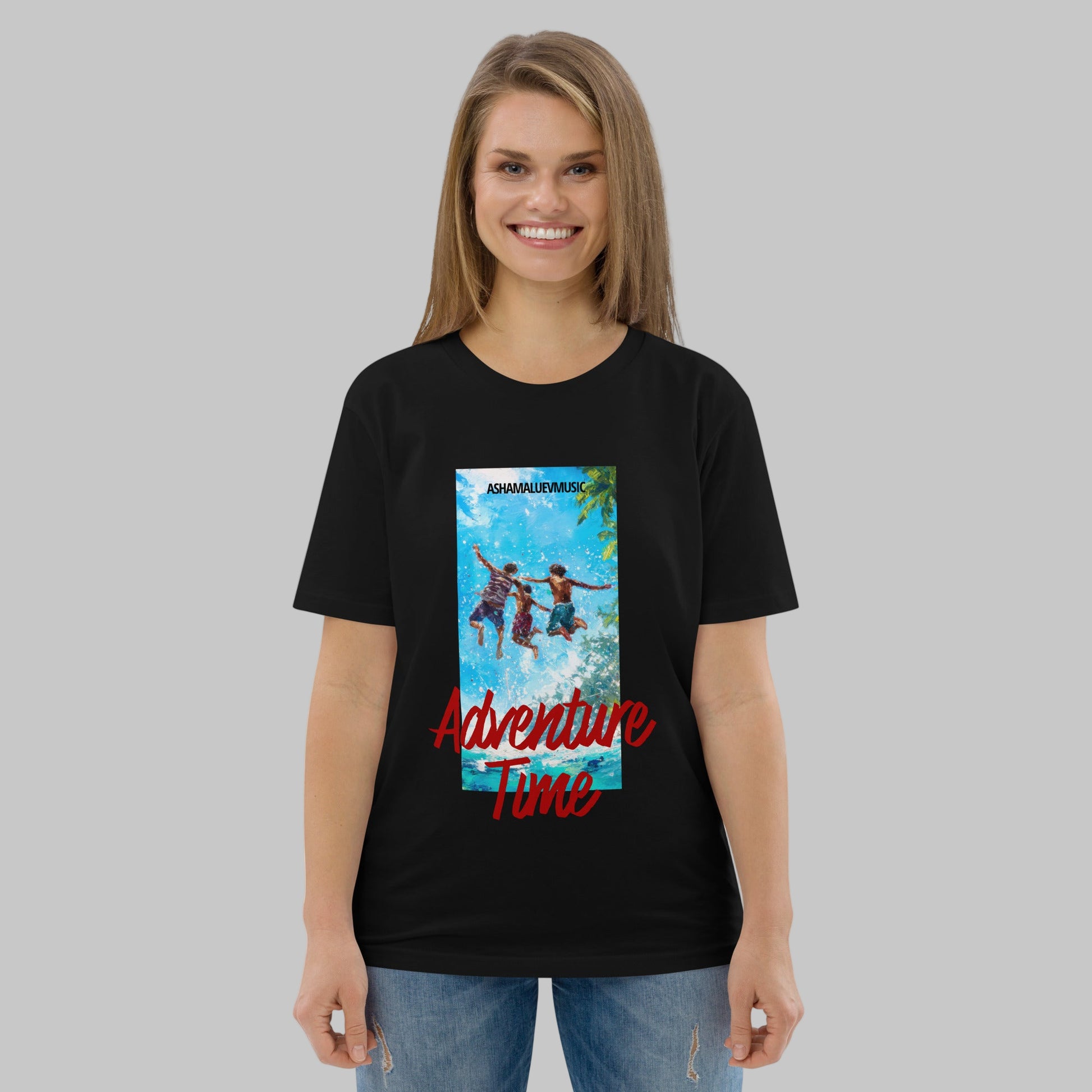 Woman wearing a black t-shirt with 'Adventure Time' graphic design and AShamaluevMusic logo on a grey background.