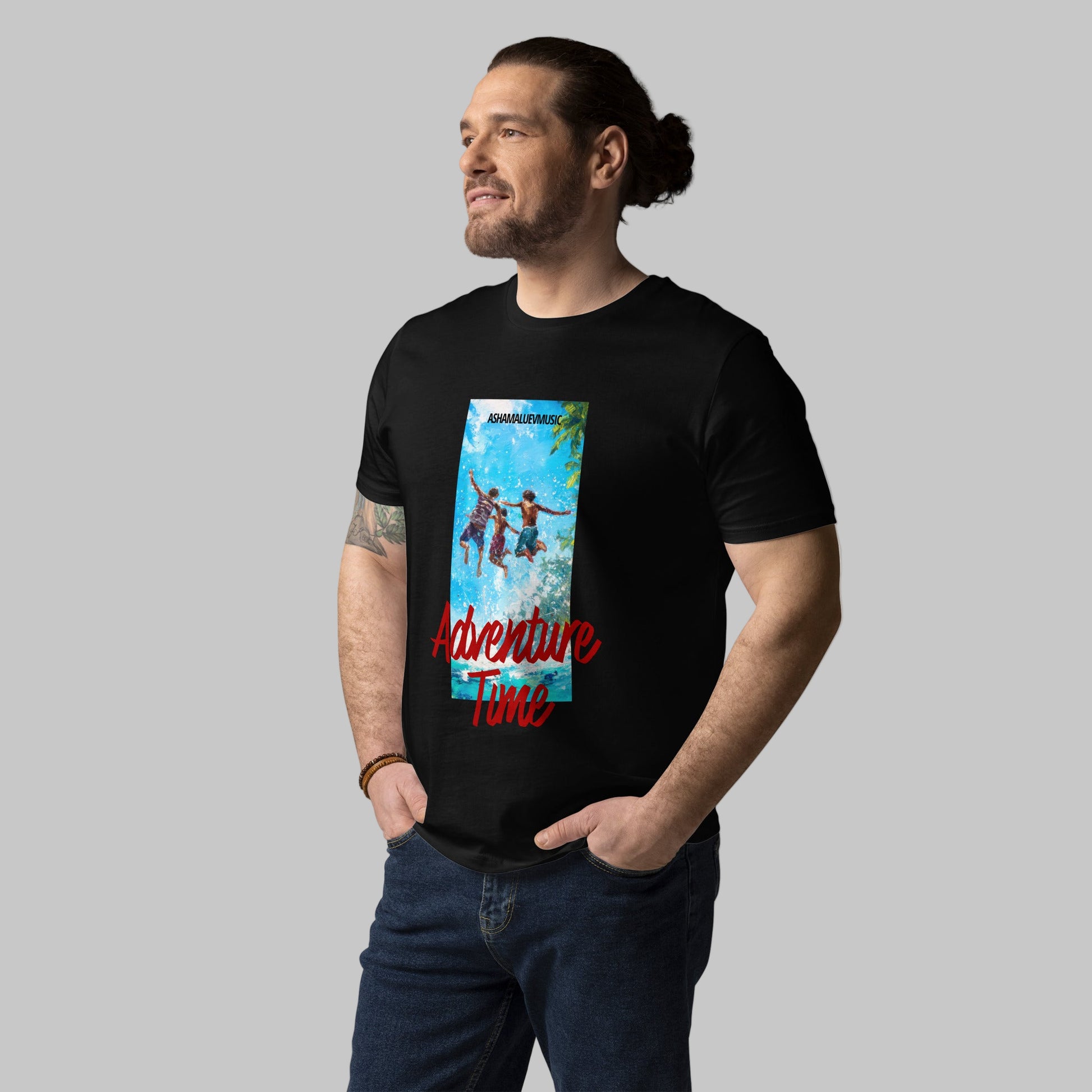 Man wearing a black t-shirt with 'Adventure Time' graphic design and AShamaluevMusic logo on a grey background.