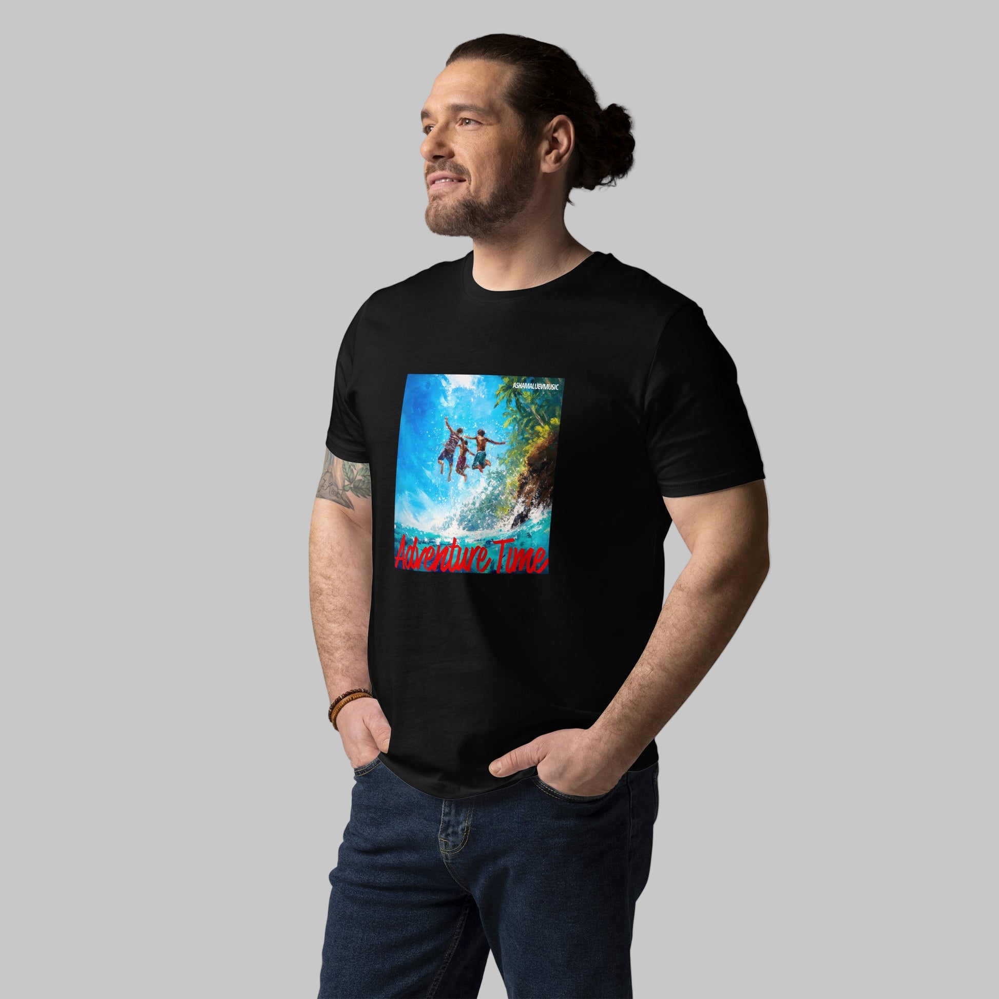 Man wearing a black t-shirt with a 'Adventure Time' graphic design and AShamaluevMusic logo on a grey background.