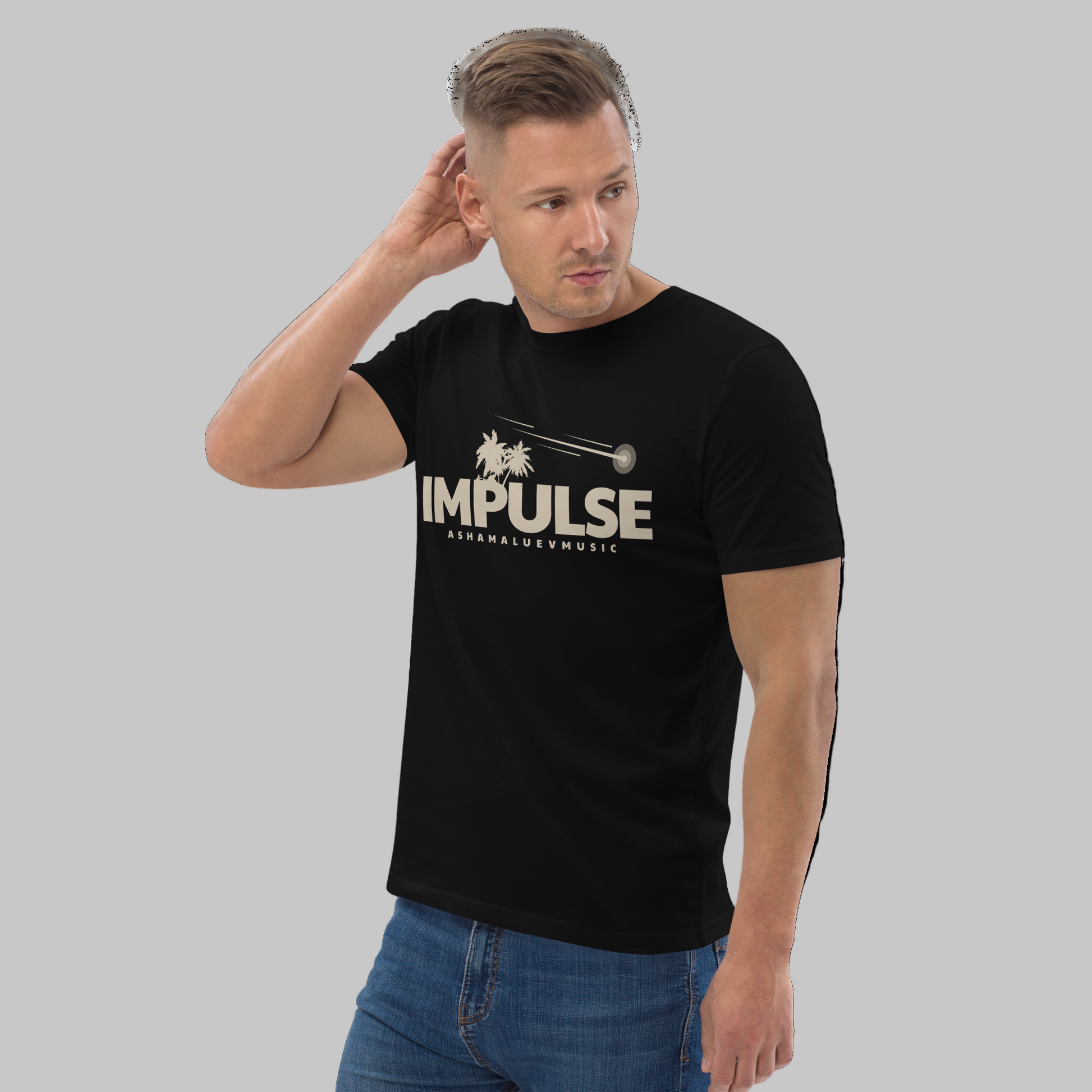 Man wearing a black t-shirt with text 'IMPULSE' and AShamaluevMusic logo on a grey background