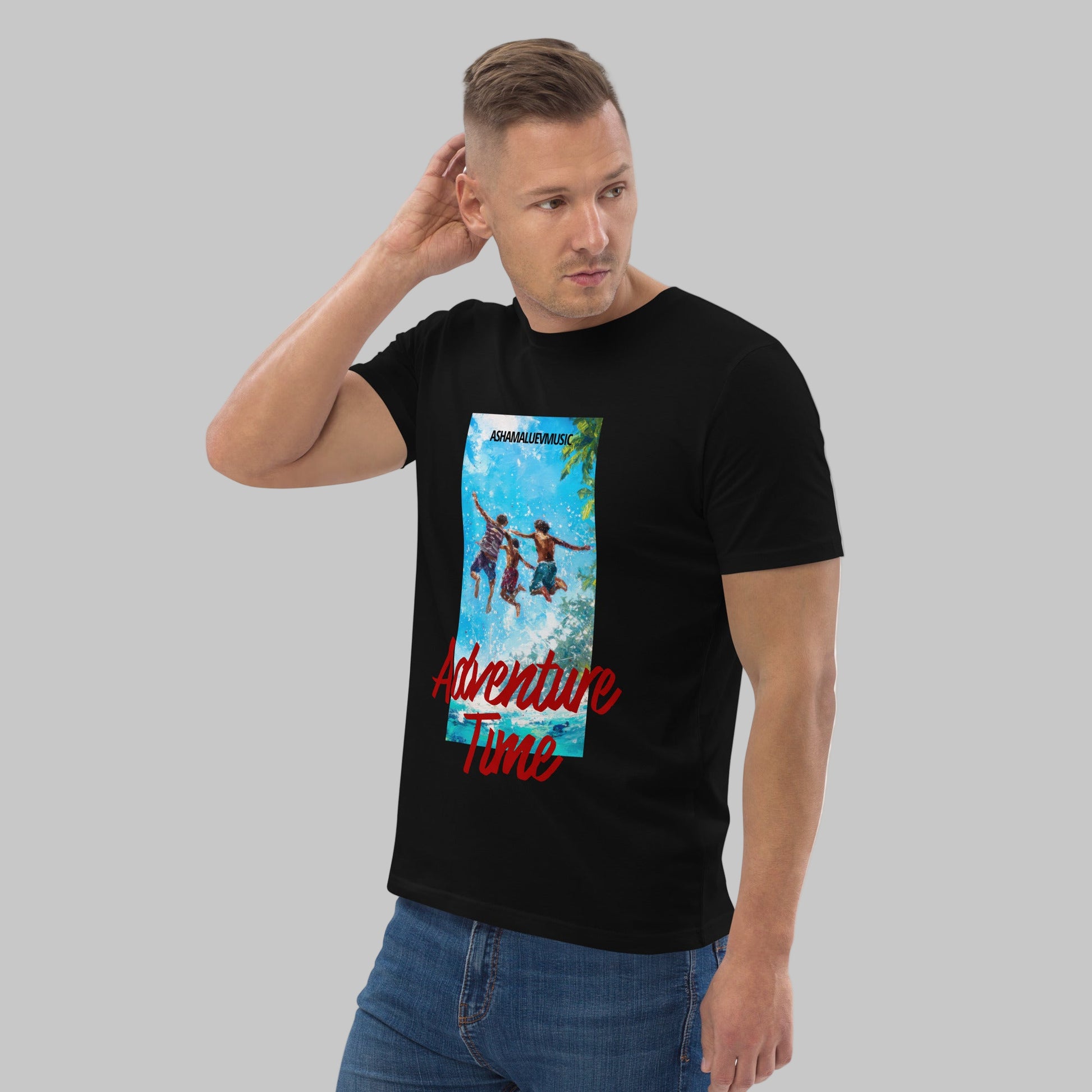 Man wearing a black t-shirt with 'Adventure Time' graphic design and AShamaluevMusic logo on a grey background.