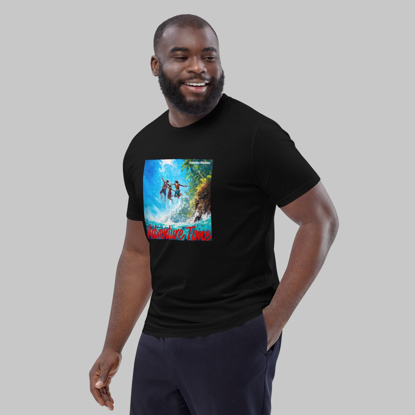 Man wearing a black t-shirt with a 'Adventure Time' graphic design and AShamaluevMusic logo on a grey background.