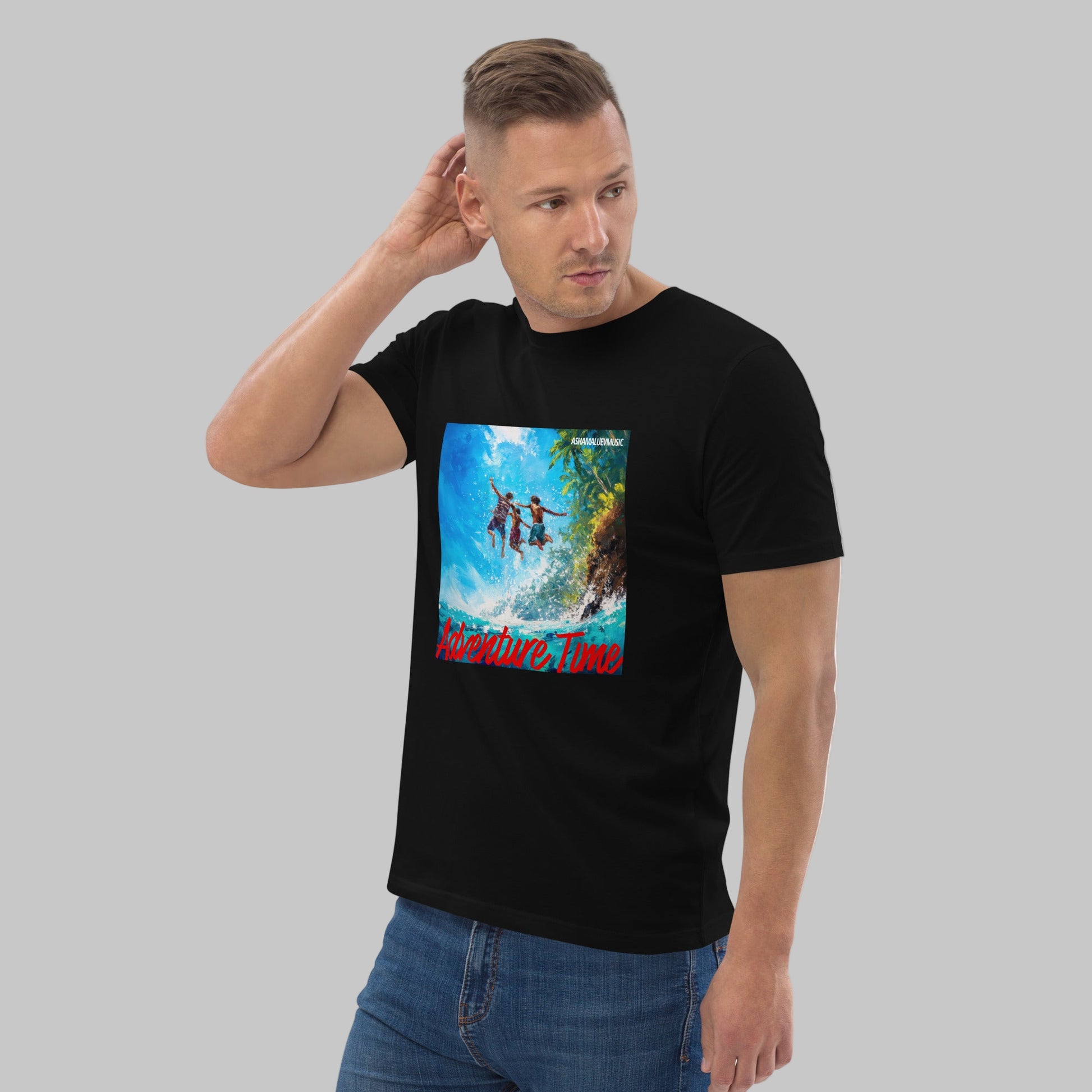 Man wearing a black t-shirt with a 'Adventure Time' graphic design and AShamaluevMusic logo on a grey background.