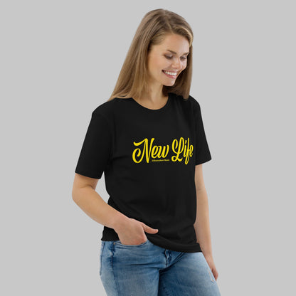 Woman wearing a black organic cotton t-shirt with 'New Life' print and AShamaluevMusic logo in yellow text on a grey background