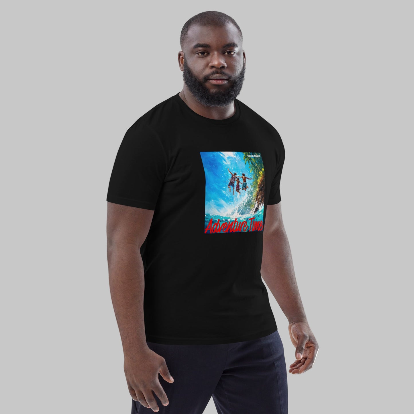 Man wearing a black t-shirt with a 'Adventure Time' graphic design and AShamaluevMusic logo on a grey background.