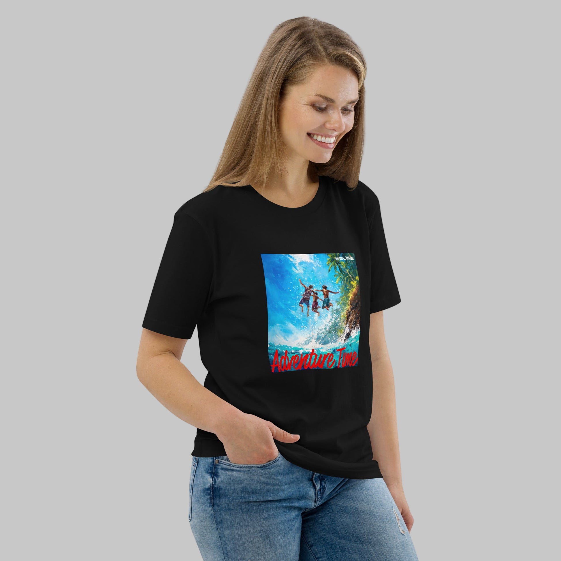 Woman wearing a black t-shirt with a 'Adventure Time' graphic design and AShamaluevMusic logo on a grey background.