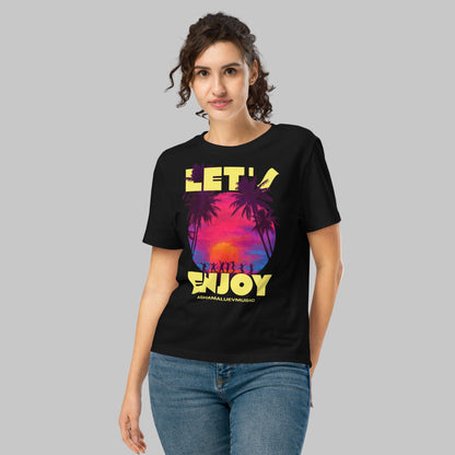 Woman wearing a black t-shirt with a 'Let's Enjoy' print and AShamaluevMusic logo on a grey background