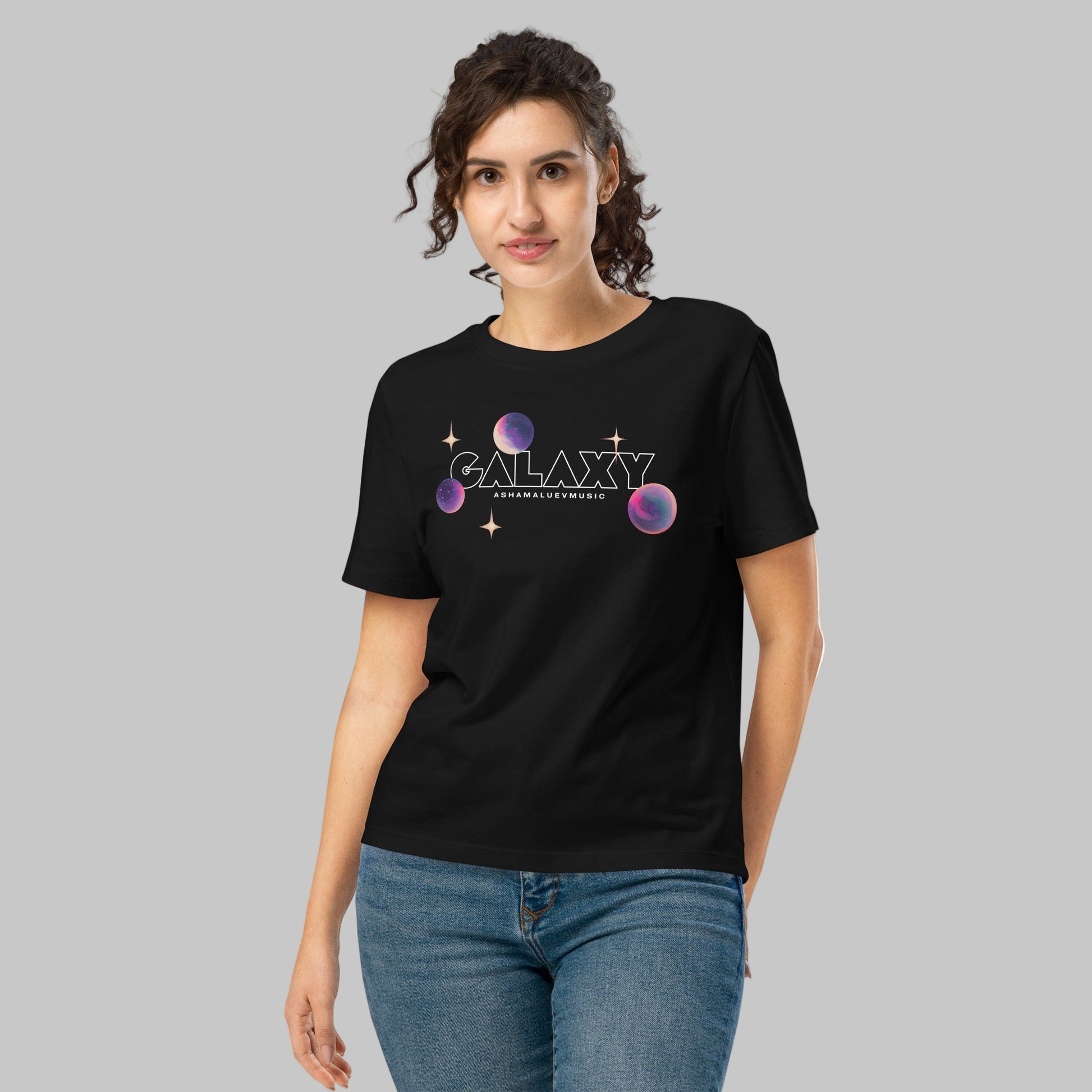 Woman wearing a black t-shirt with a 'Galaxy' design and AShamaluevMusic logo on a white background