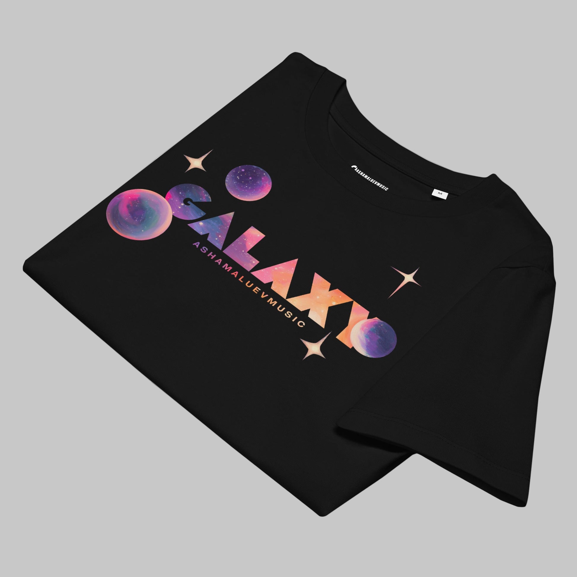 Black t-shirt with a 'Galaxy' design and AShamaluevMusic logo on a light grey background