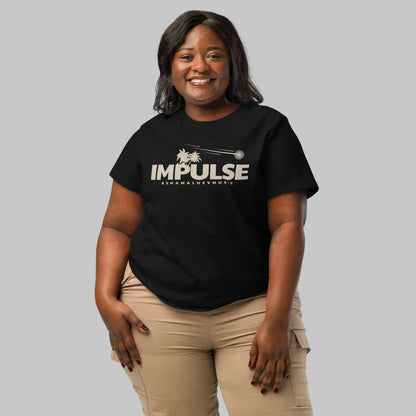 Woman wearing a black organic short sleeve t-shirt with beige text 'IMPULSE' and 'AShamaluevMusic' on a gray background