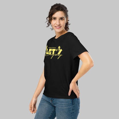 Woman wearing a black t-shirt with yellow graphics 'Let's Enjoy' and AShamaluevMusic logo on a grey background